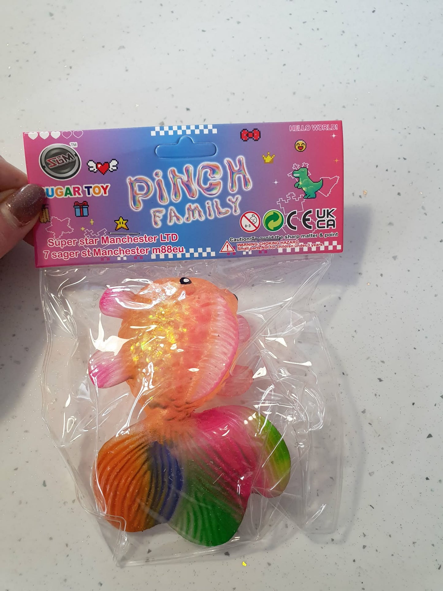 squishy stretch glitter fish with rainbow tail