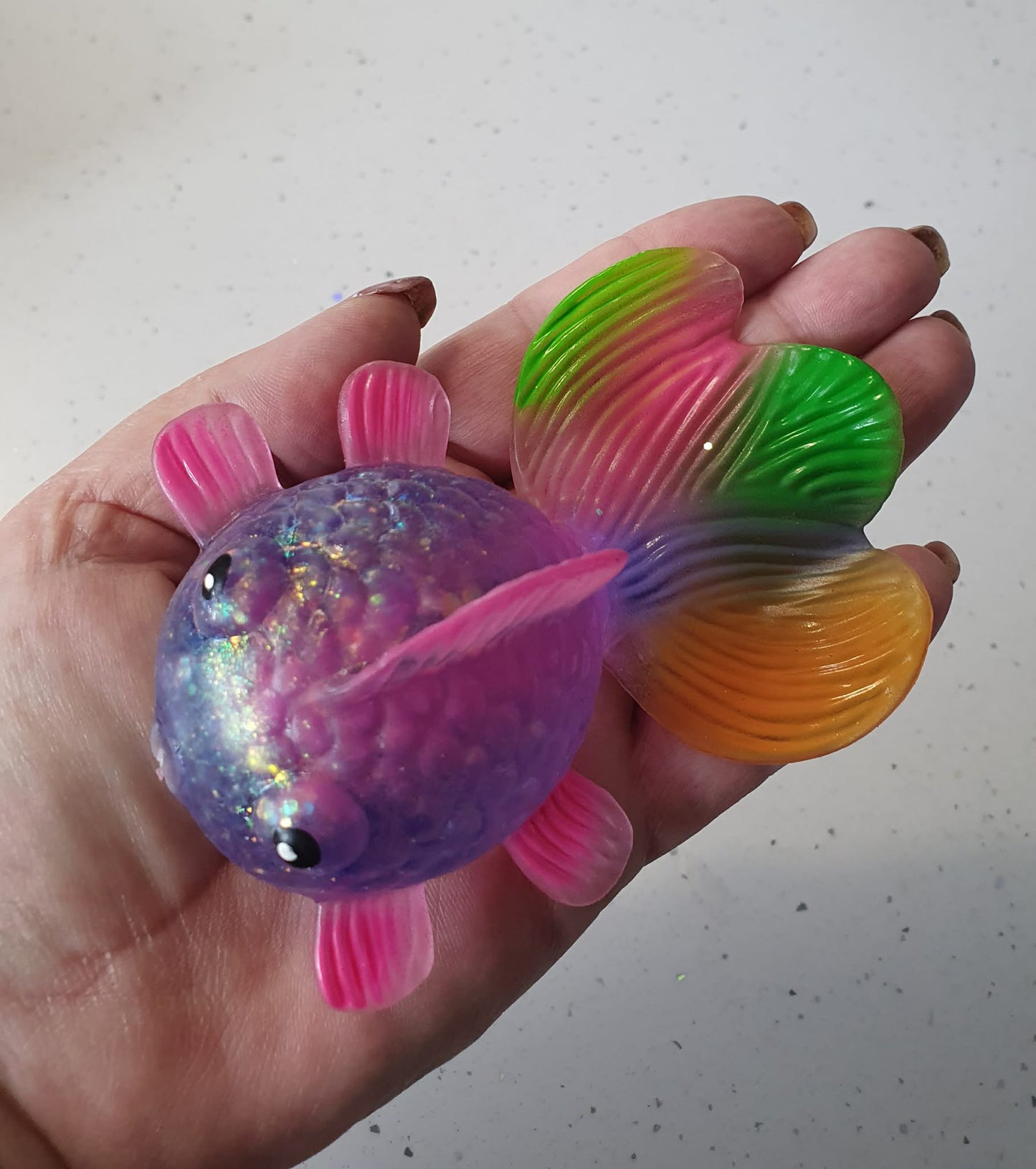 squishy stretch glitter fish with rainbow tail