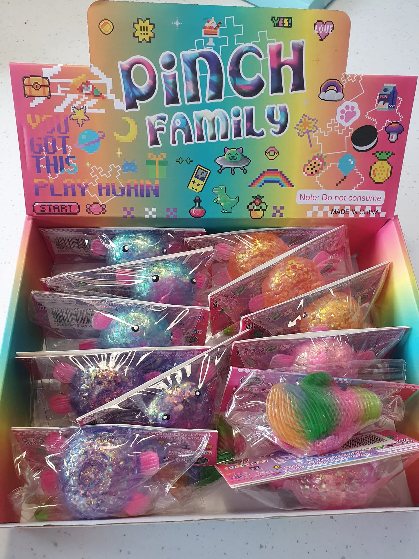 squishy stretch glitter fish with rainbow tail