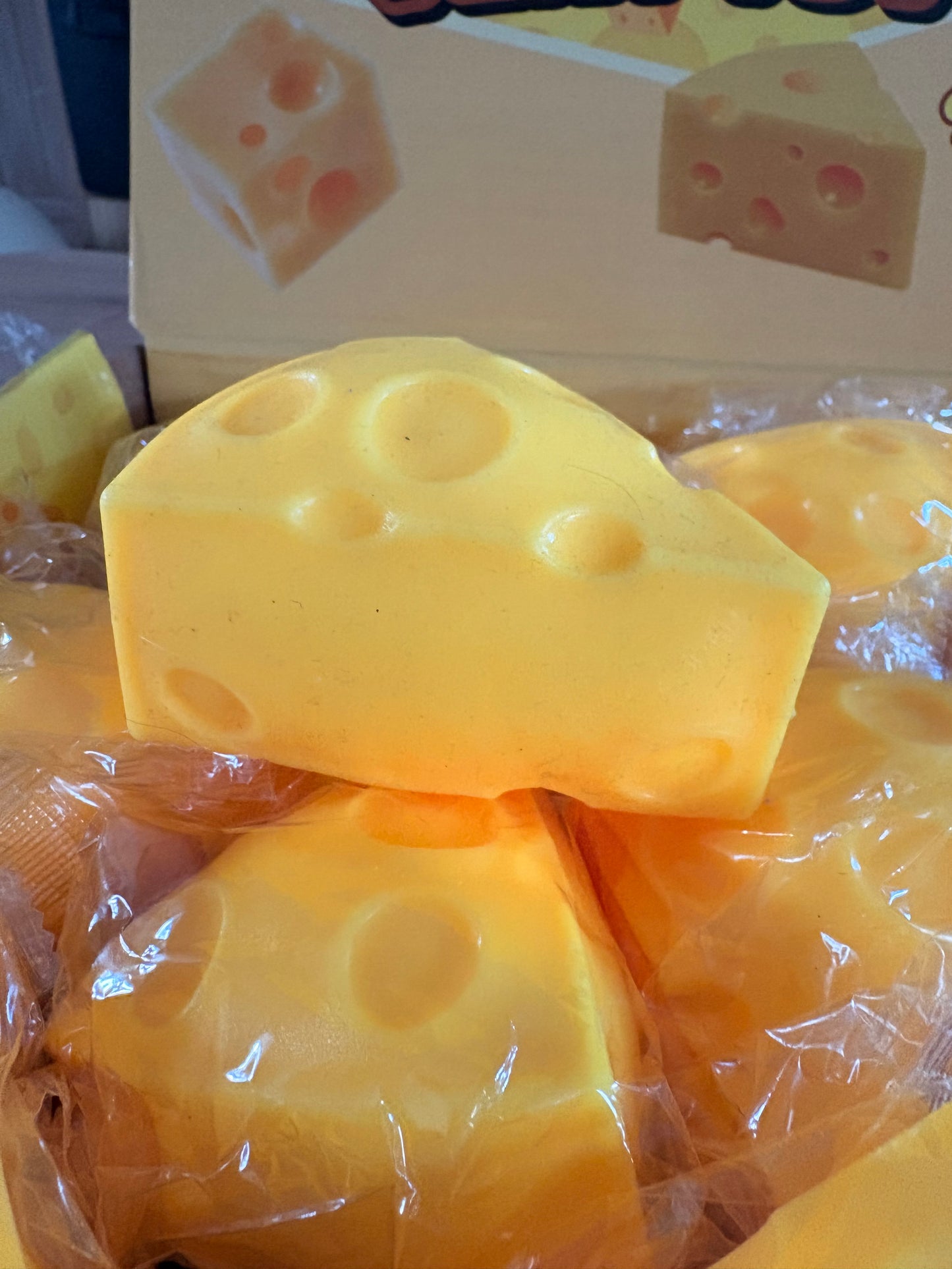Small squishy foam filled cheese triangle