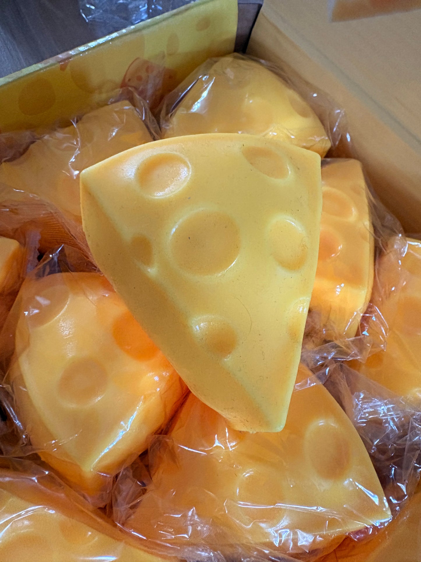 Small squishy foam filled cheese triangle