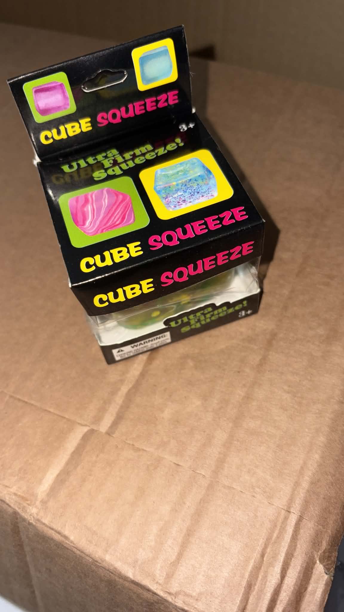 Graffiti squish cubes brightly coloured fidget toy